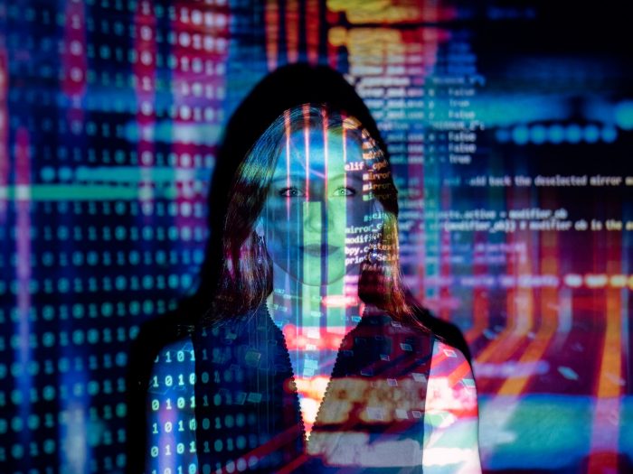 code-projected-over-woman-3861969