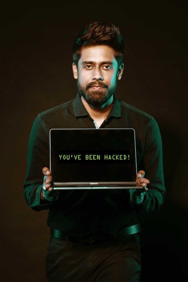 Photo by Saksham Choudhary: https://www.pexels.com/photo/man-holding-laptop-computer-with-both-hands-2036656/